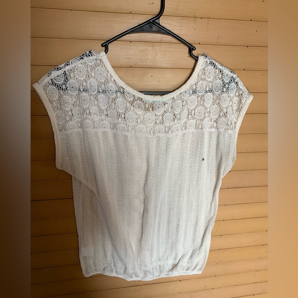 Cream colored Maurice’s shirt